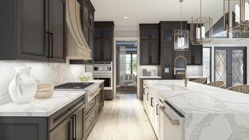 The kitchen includes stainless steel appliances and a built-in cooktop. A doorway down the hall opens to the mudroom.