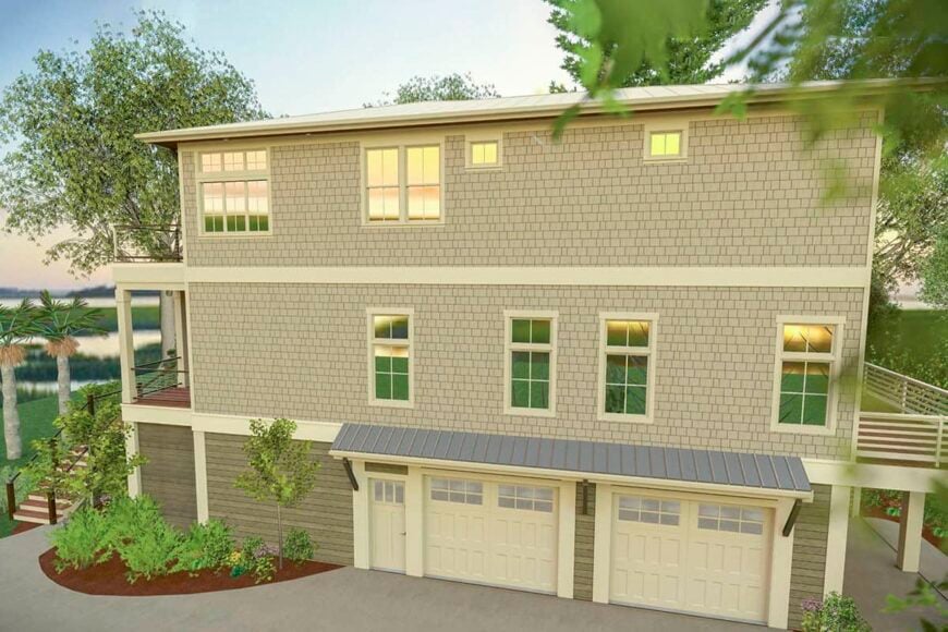Right rendering with two bay garage topped with metal awning.
