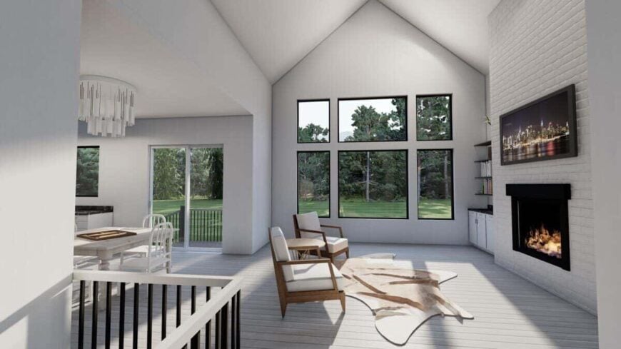 The living room has cushioned seats, a cowhide rug, and a fireplace topped with a wall-mounted TV.