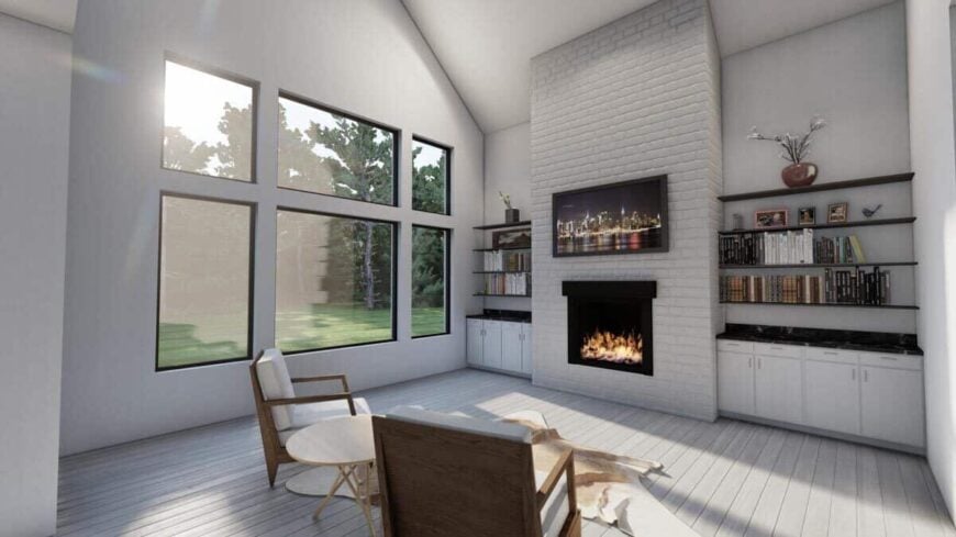 Large windows along with a cathedral ceiling enhance the light and airy feel in the living room.