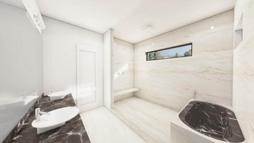 The primary bathroom features a dual sink vanity and a wet room with a tiled bench, a drop-in tub, and a clerestory window.