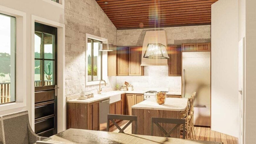 The kitchen offers natural wood cabinetry, stainless steel appliances, a breakfast island, and a farmhouse sink.