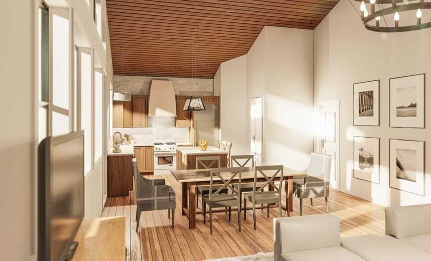 A vaulted ceiling clad in wood planks crowns the open living space.