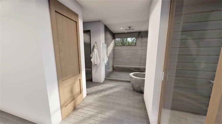 A walk-in shower and a freestanding tub complete the primary bathroom.