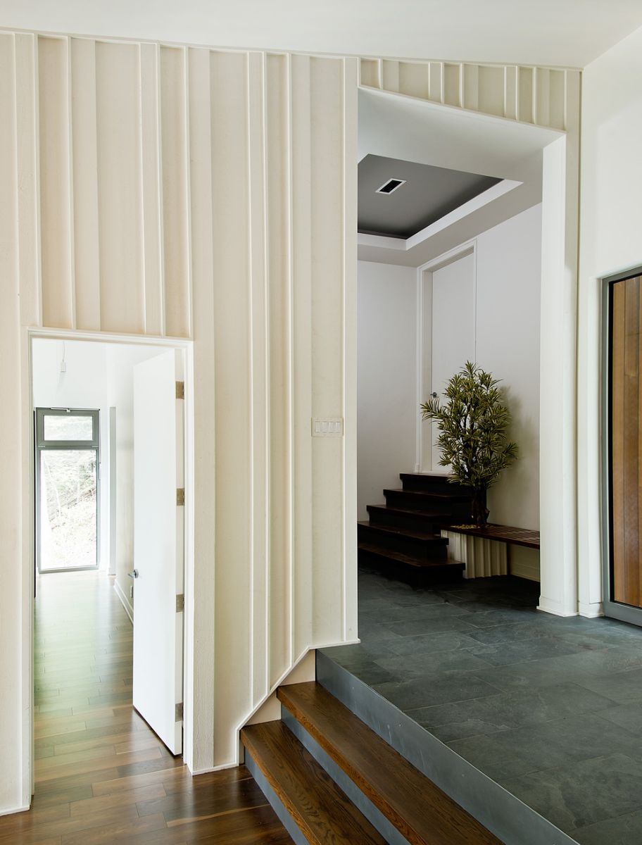 The hall that leads to different areas of the house.