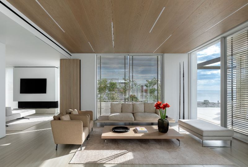 A modern living space with motorized sliding door.