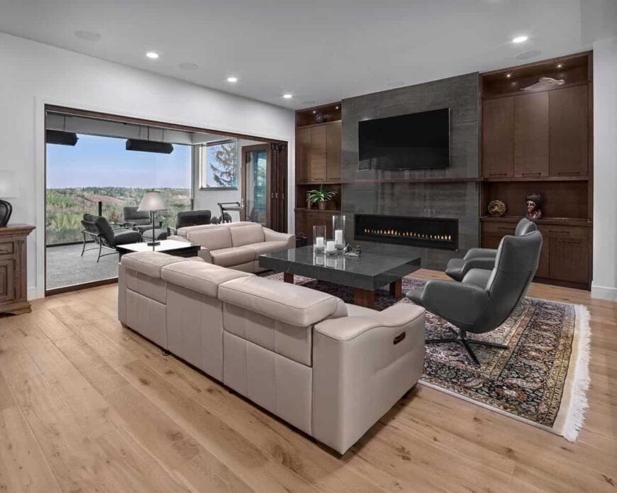 Folding doors on the other side extends the living space onto a covered porch.