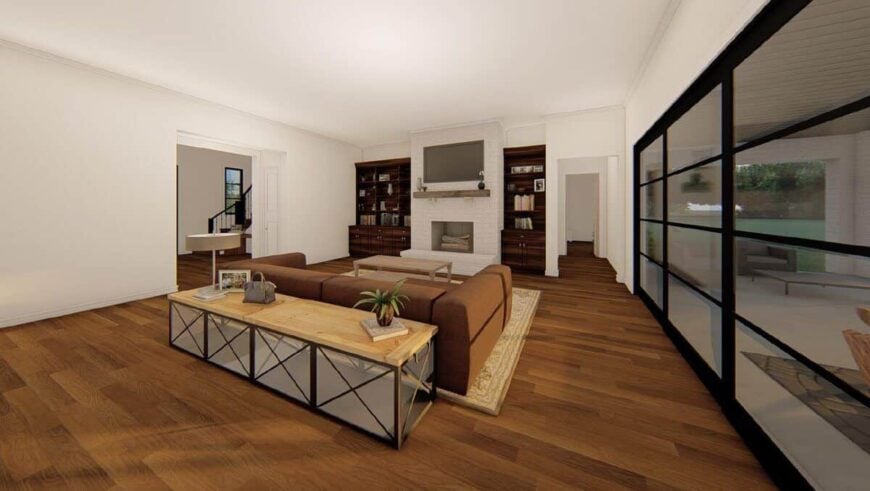 The living room has a brown sofa and a TV above the fireplace flanked by wooden built-ins.