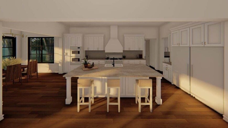 The kitchen features a granite-top island surrounded by white cabinets and appliances.
