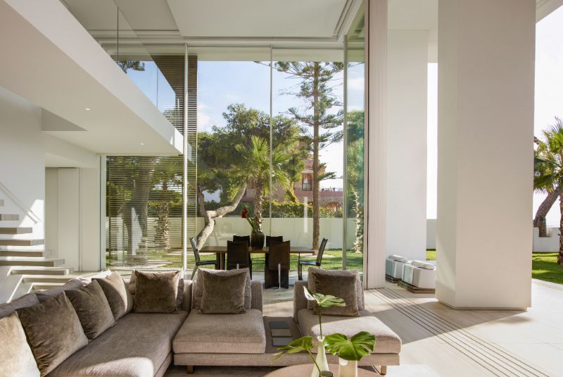 The patio with large concrete beamed facing the beautiful landscape.