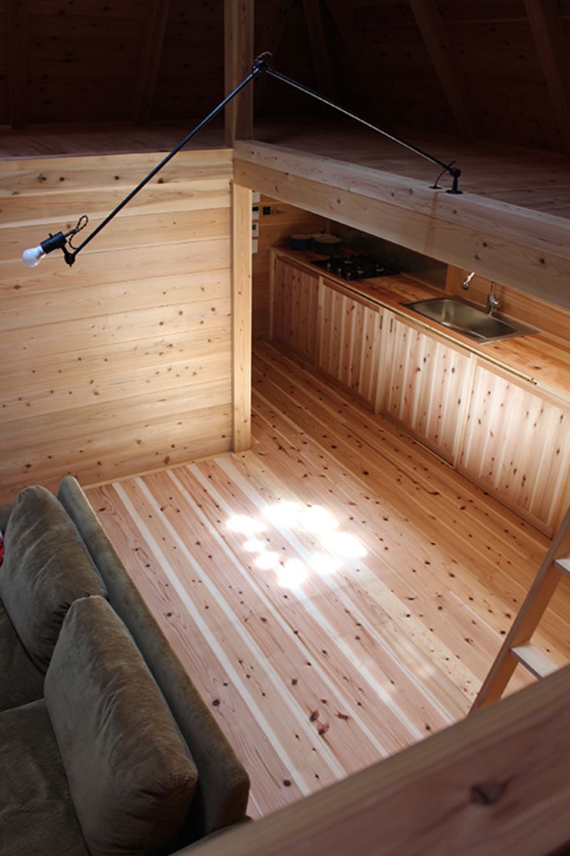 The wood enclosed living space near to kicthen.