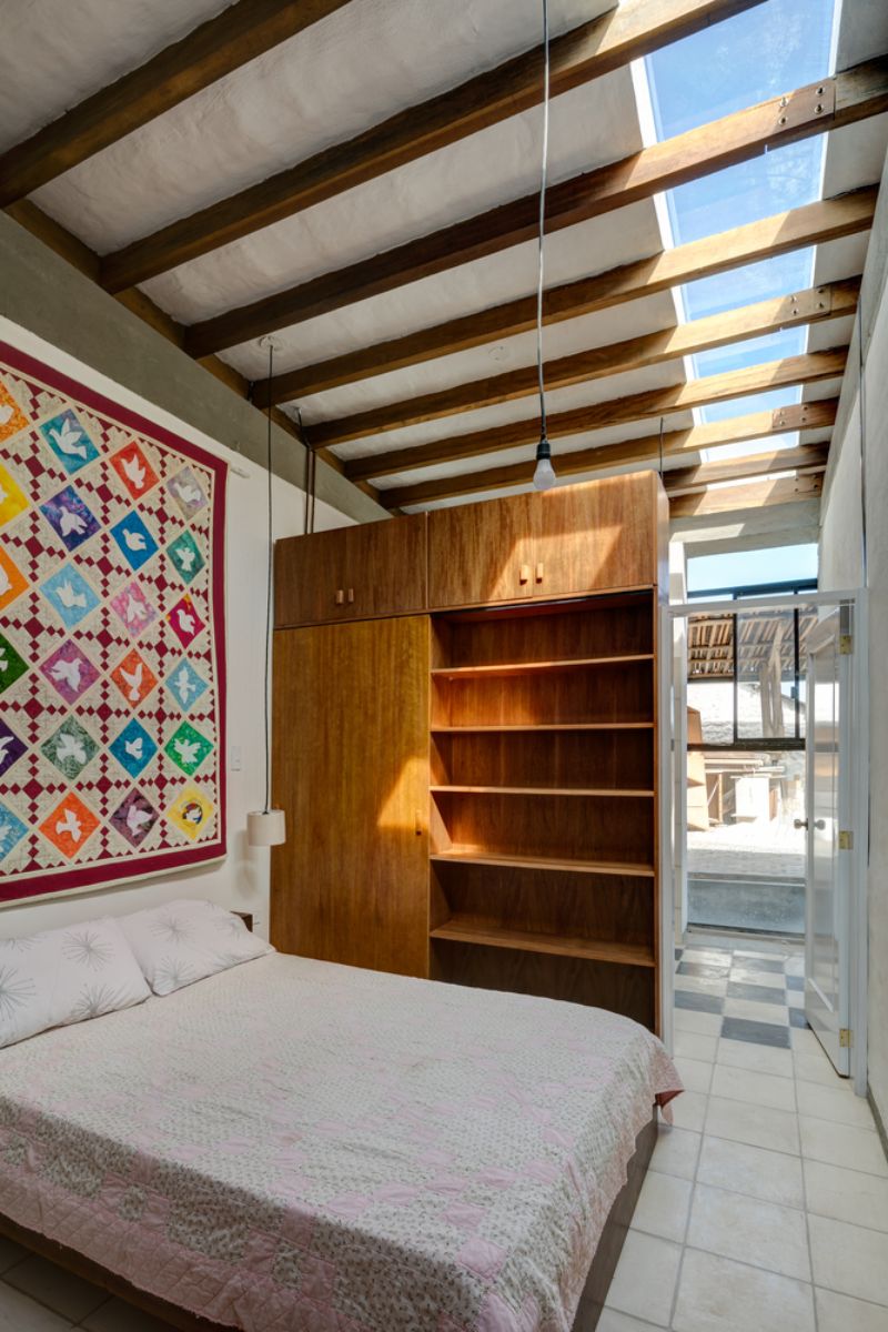 The sky lit beamed ceiling main bedroom.