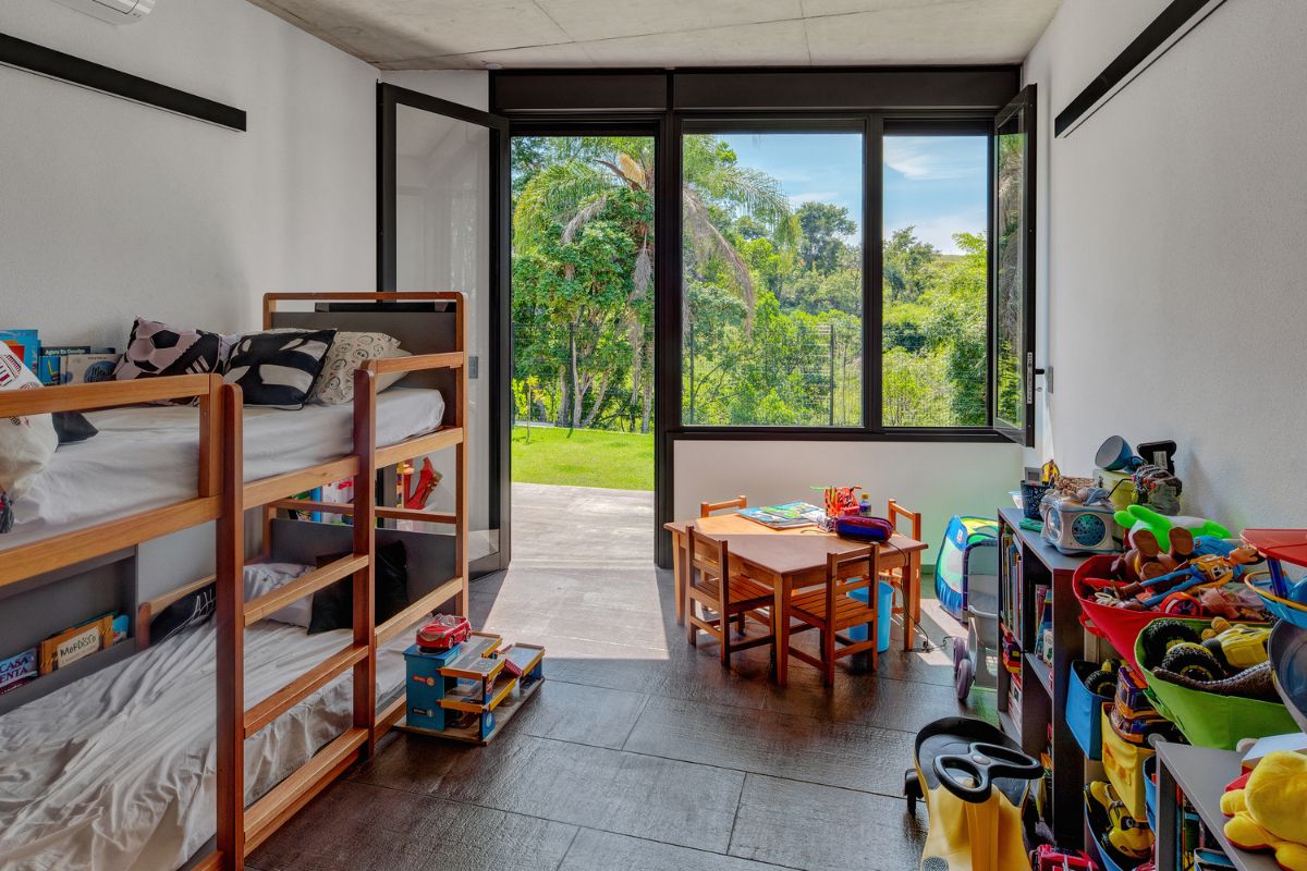 The kids room with glass door leading to the garden.