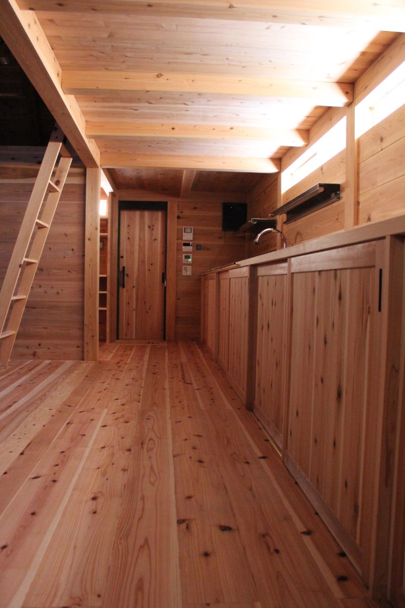 A kitchen solely constructed from woods.