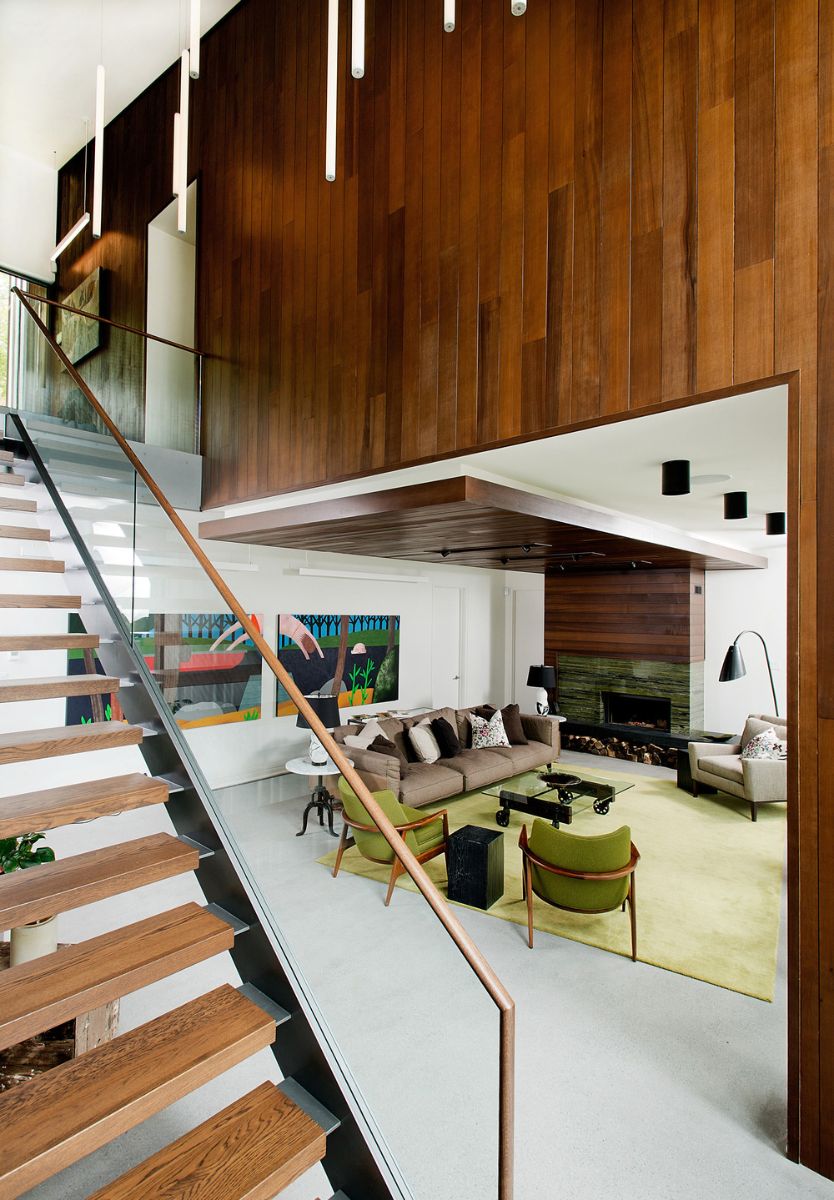 The wooden stairs closed to living room.