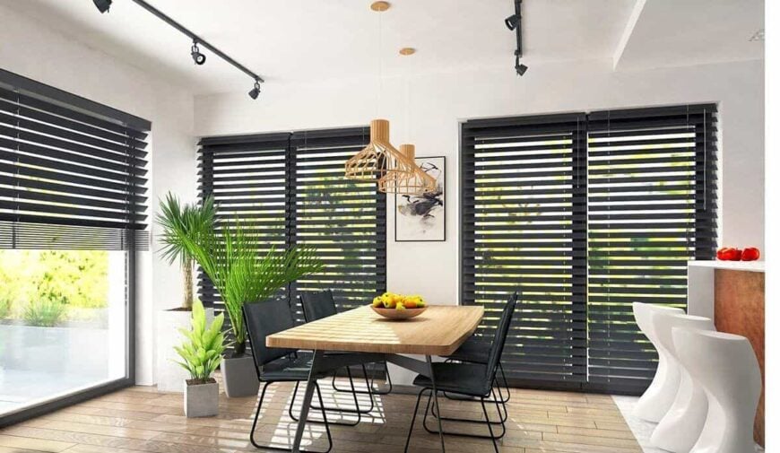 Sliding glass doors extend the dining area onto the side and back porches.