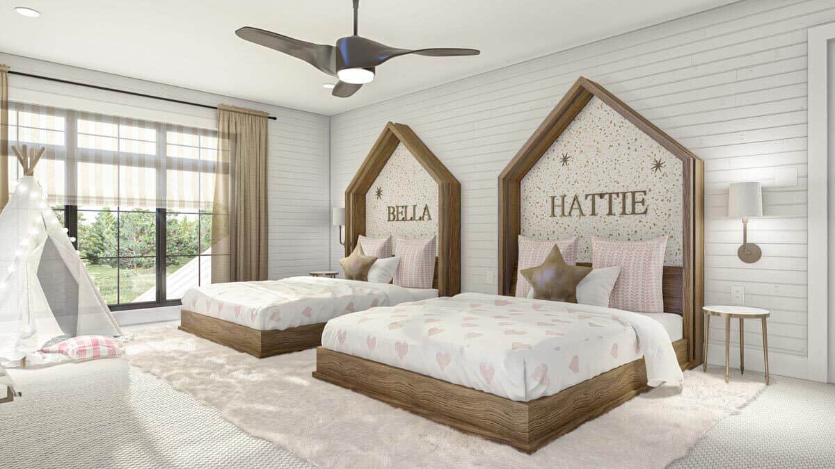 Kids' bedroom with white shiplap walls, carpeted floor, and wooden custom beds with their names on them.