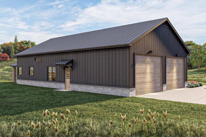 The entry porch has a french front door and a gable roof framed with exposed trusses.