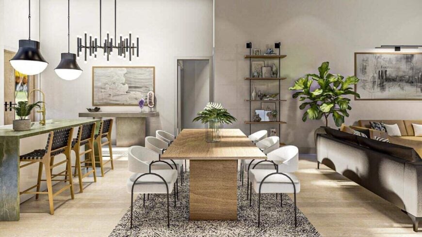 Dining area with wooden dining set over an area rug. It sits between the kitchen and living room.
