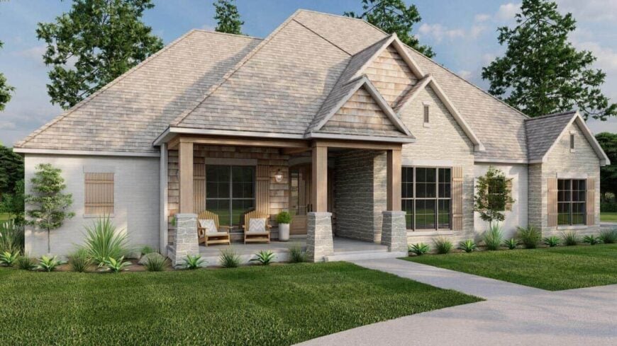 Front rendering with nested gables and a covered entry porch furnished with wooden lounge chairs.