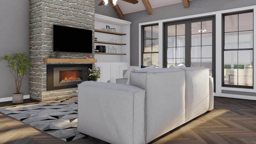 A french door flanked by tall windows extends the living room onto the screened porch.