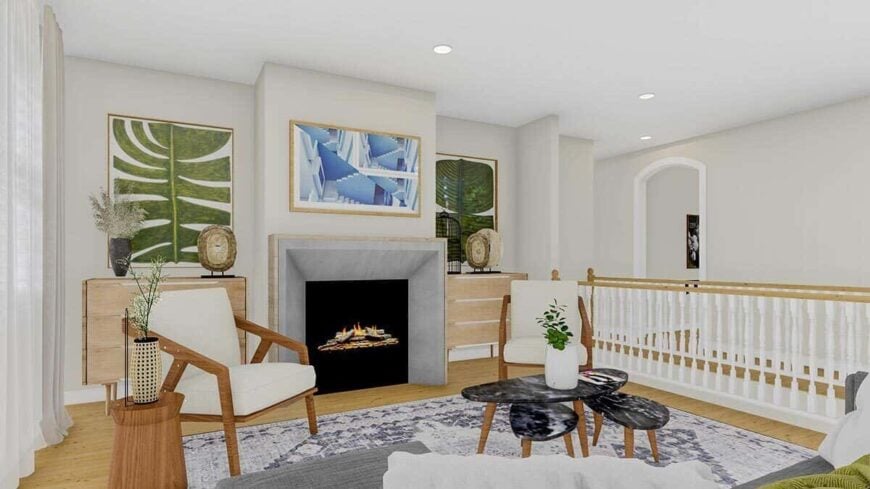 A fireplace flanked by wooden cabinets completes the living room.