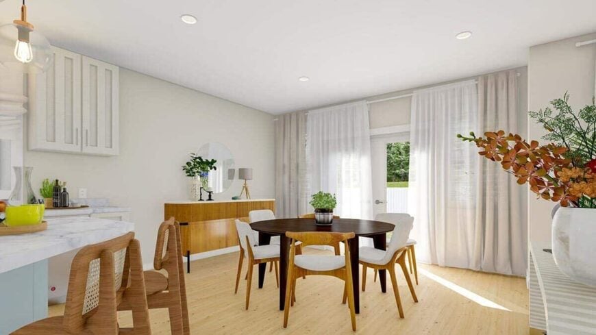 A french door concealed behind sheer drapes extends the dining area on the back patio.