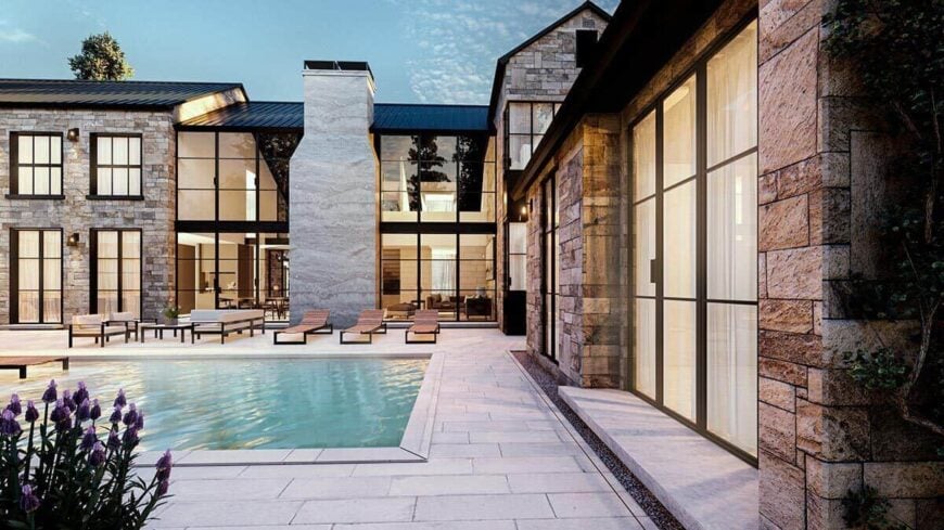 The pool terrace includes a pool house enclosed in glazed doors.