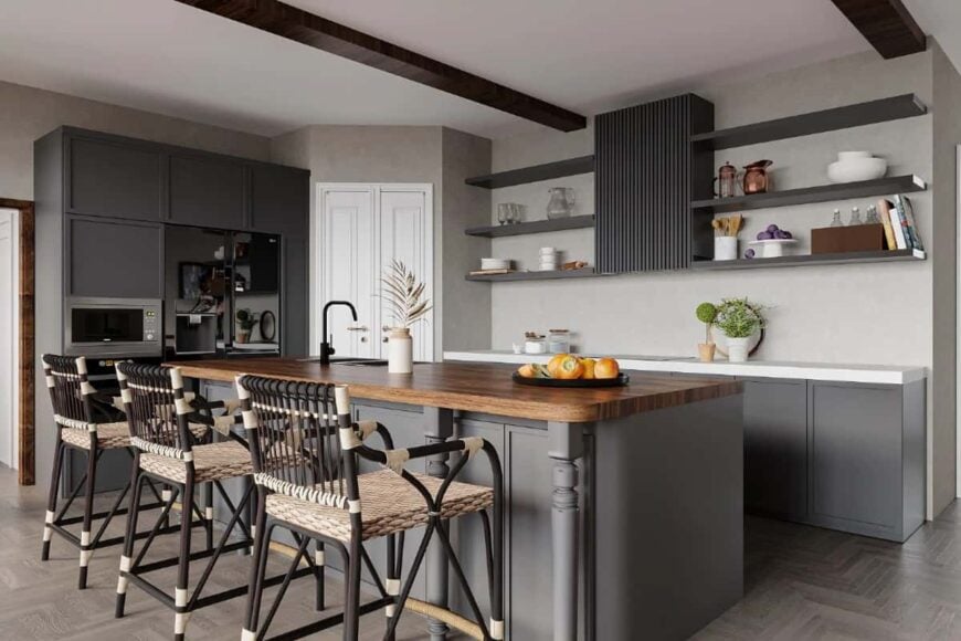 The kitchen offers a corner pantry, gray cabinets, matching floating shelves, and a breakfast island paired with wicker bar stools.