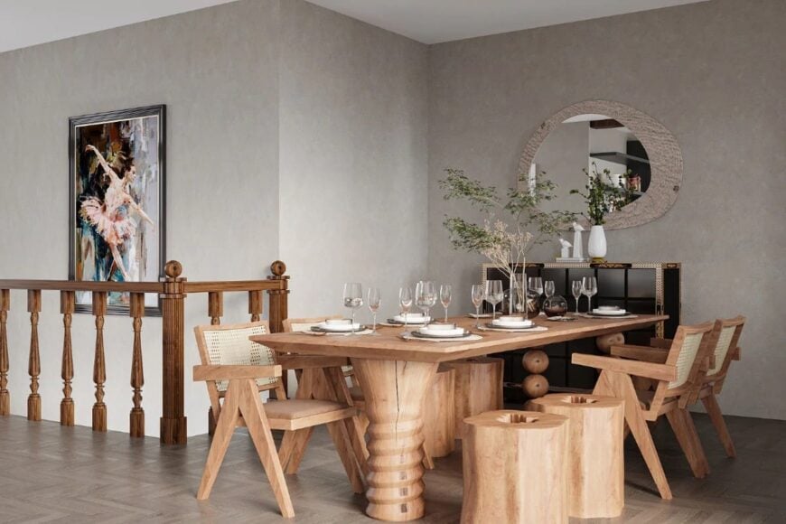 Dining area with a wooden dining set and a buffet table adorned with a contemporary mirror.