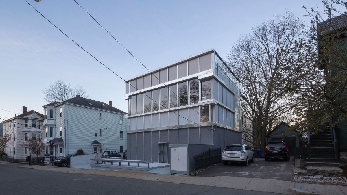 the exterior of the house, showcasing the overall design and architecture of the building