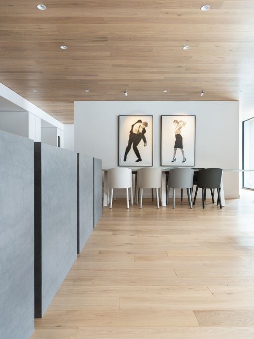 An interior shot taken from the living room, showcasing two gallery-style pictures mounted on the wall, creating a gallery-like atmosphere.