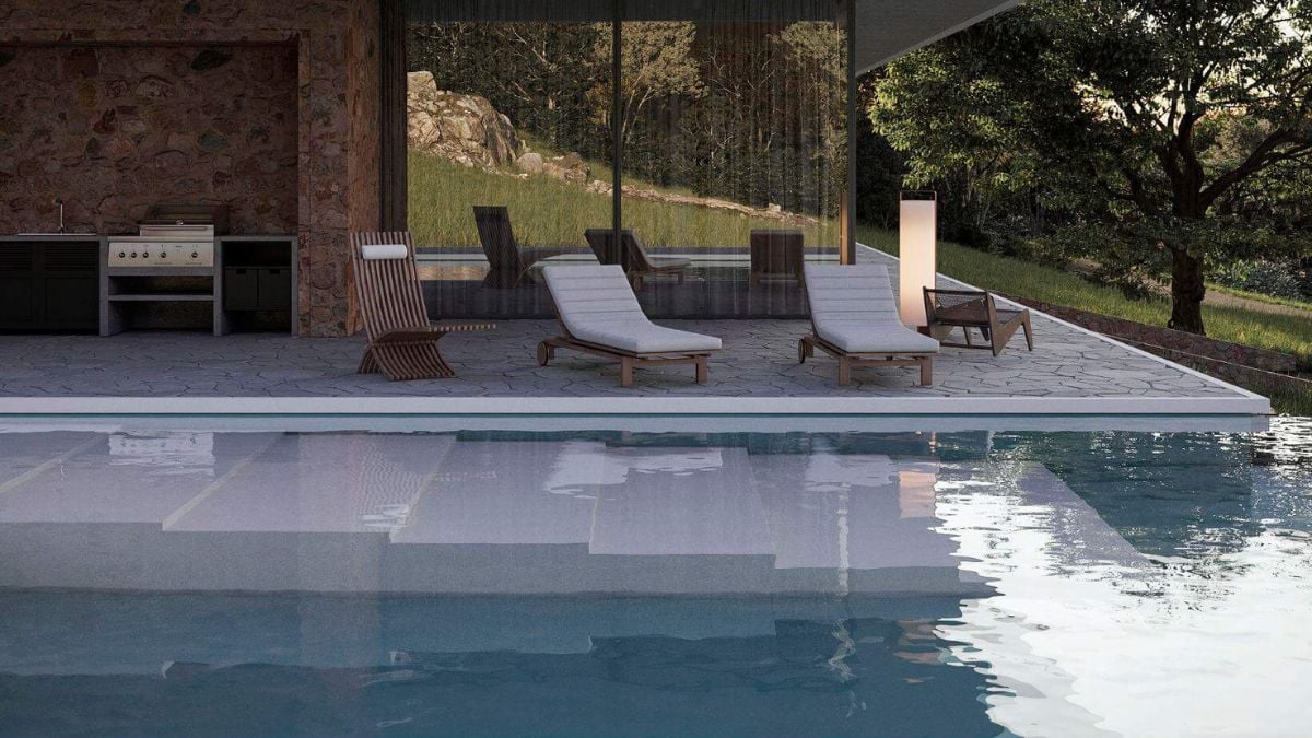The clear shapes and panoramic windows integrated into the faรงade, allowing in the maximum amount of sunlight, contribute to the house's aesthetics.