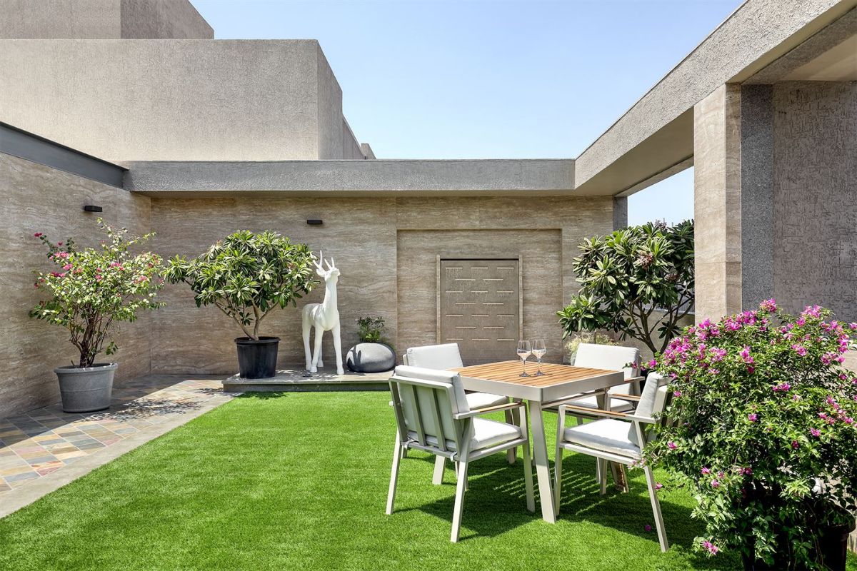 The patio garden ideal for late-night conversations under the skylights.