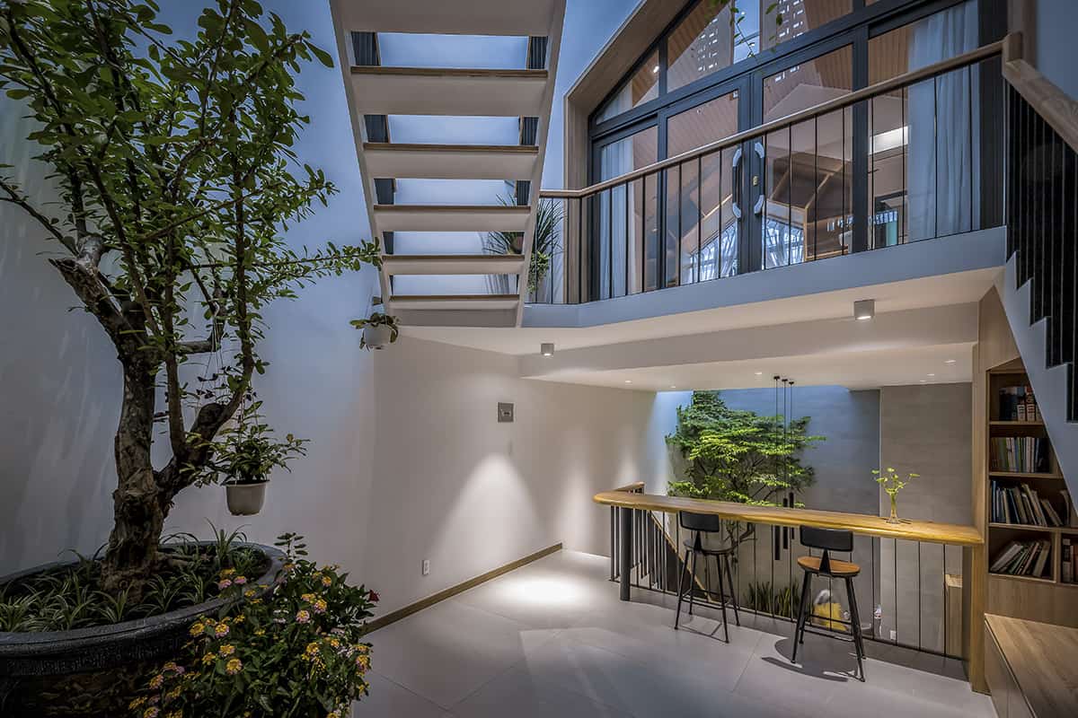 Warm lights at night enhance the tranquil ambiance of the house.