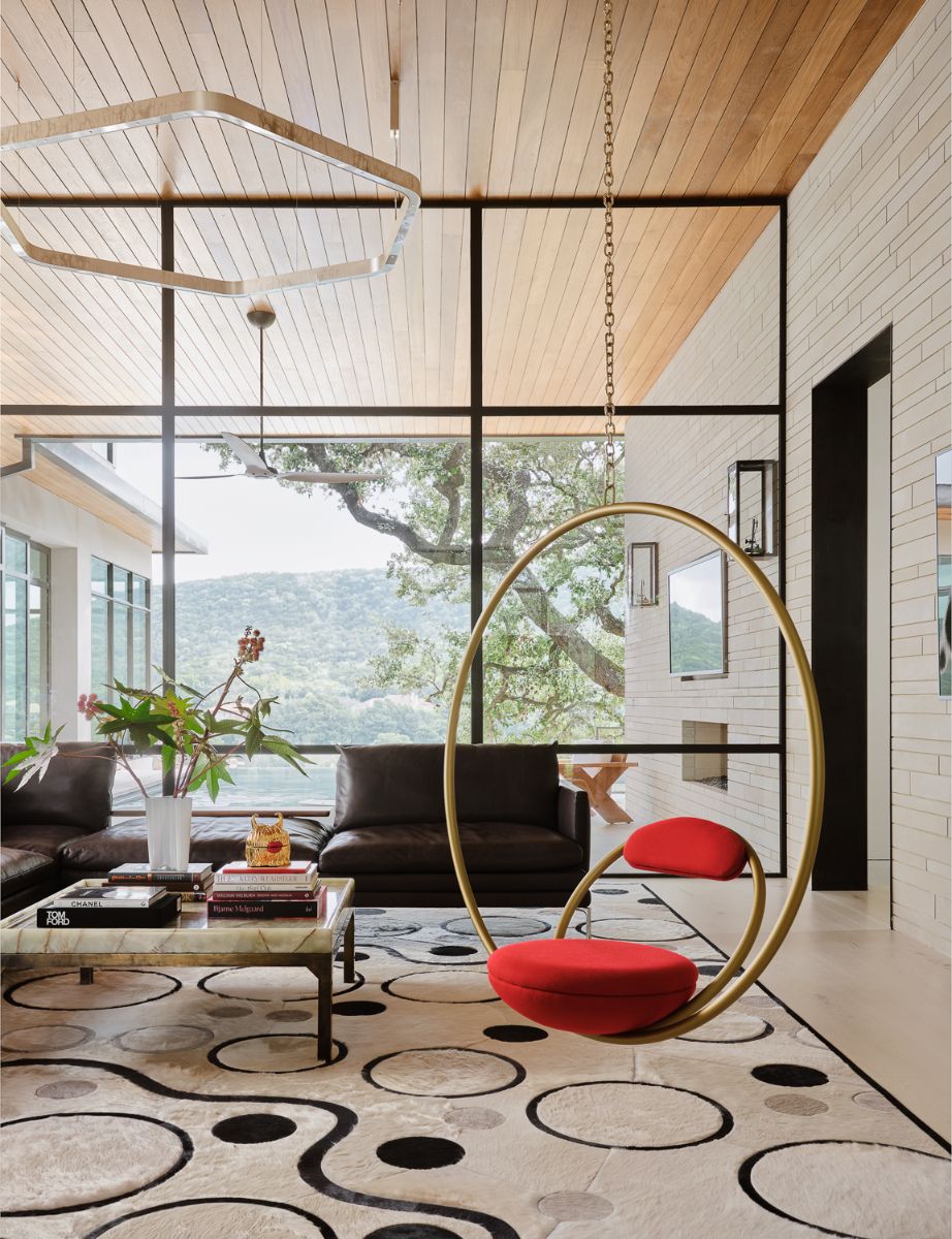 A large expanse of glass in the living area provides unobstructed views of the majestic hills.