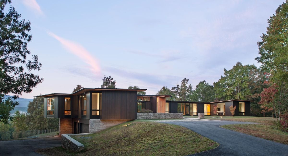 The house has two entrances, one for the garage and one for the main entrance.