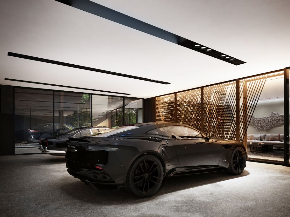 In front of the lounge is a garage with luxury cars.