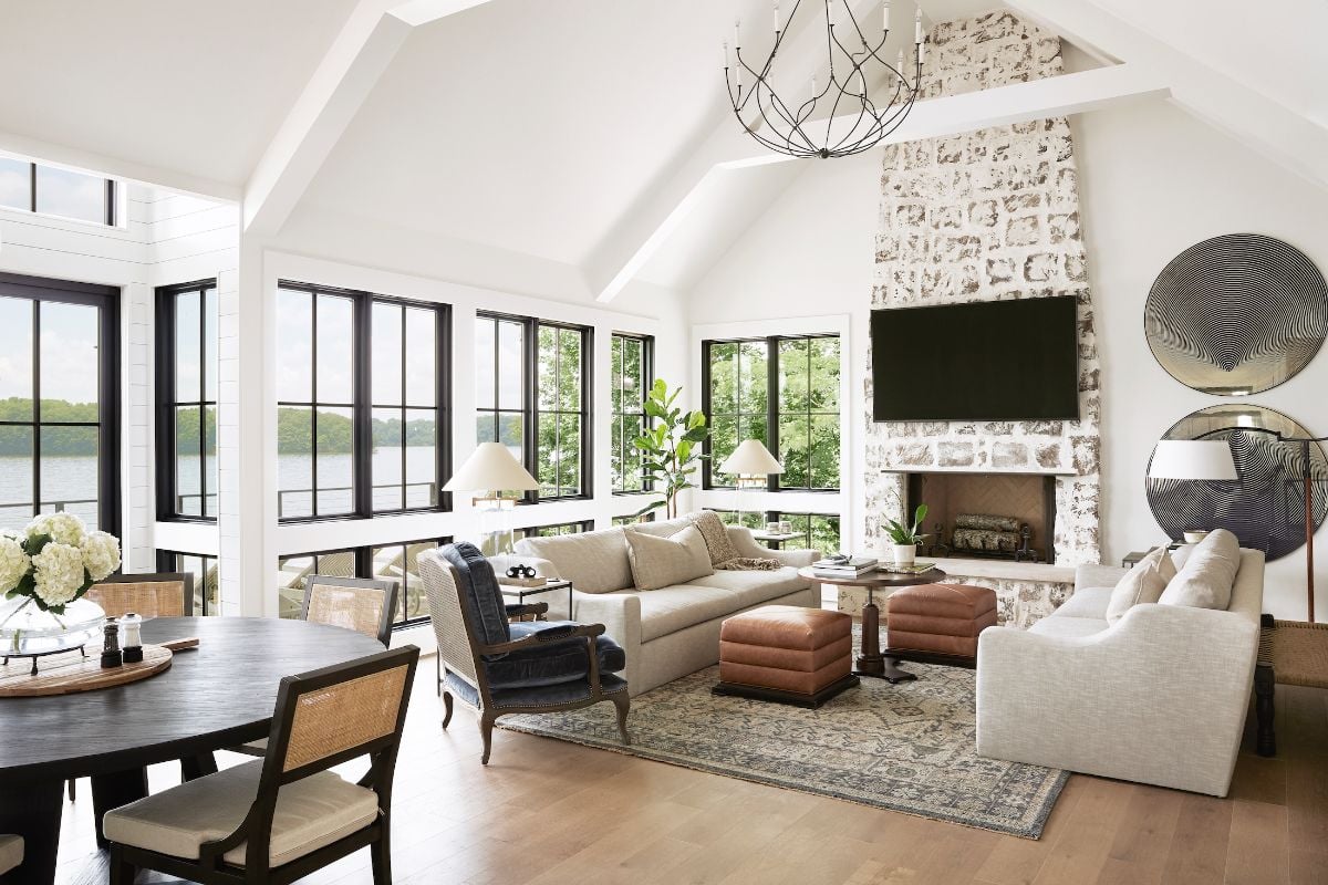 The living room features a fireplace that keeps the room warm, and the sofa gives a cozy atmosphere.