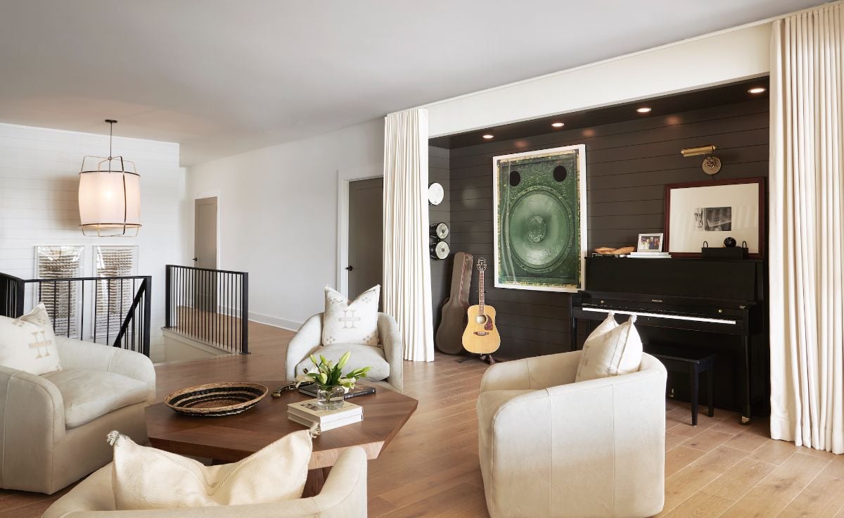 The lounge also serves as the music room and features some musical instruments.
