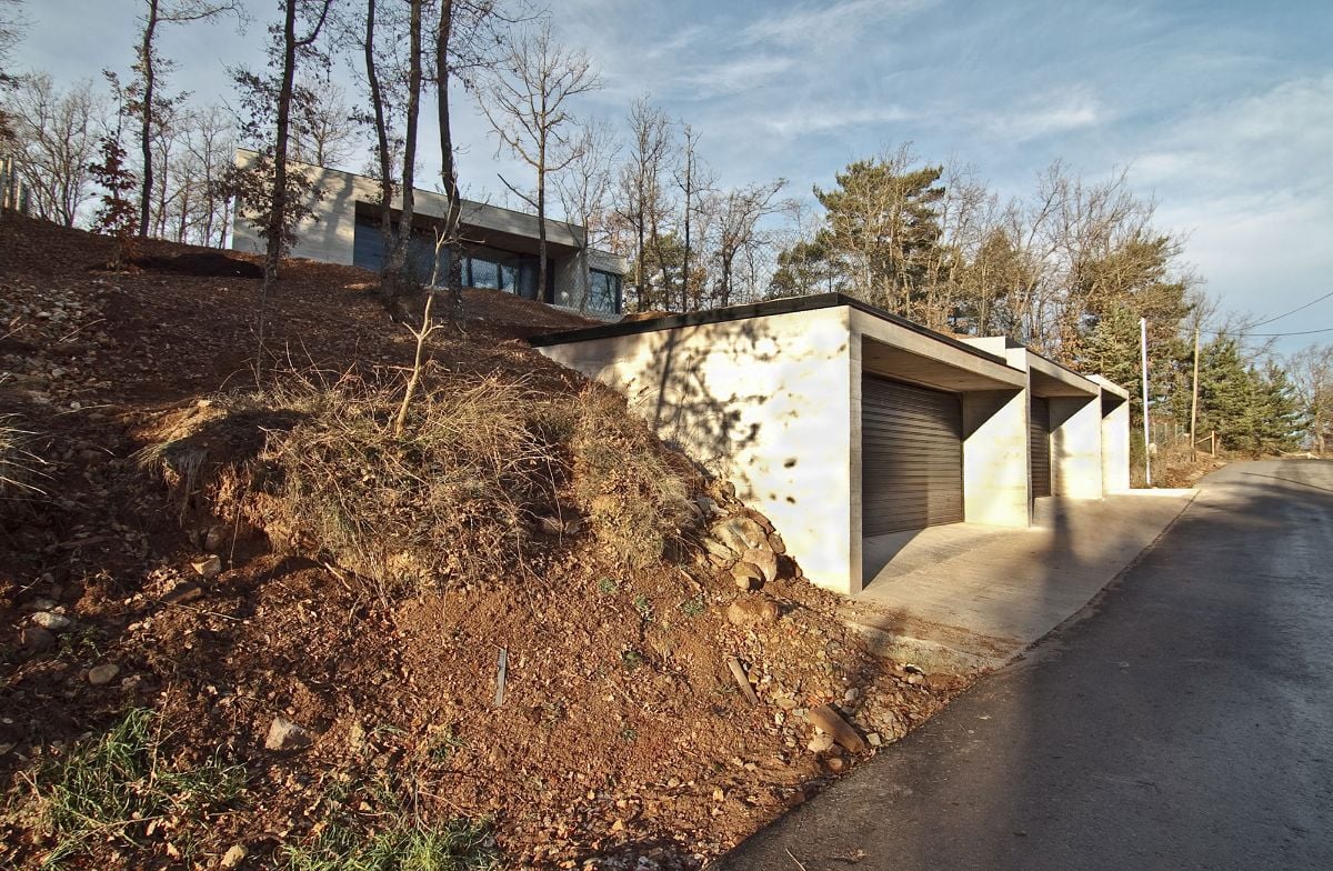 The buried parking is seamlessly integrated into the landscape.