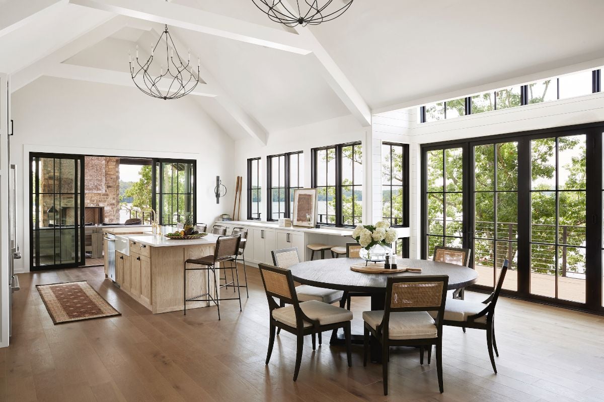 Next to the kitchen is the dining area that features a round table.