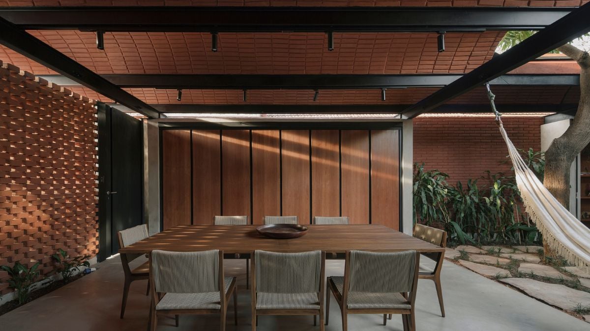 The spacious dining space is almost entirely built of wood materials, with the exception of the flooring.