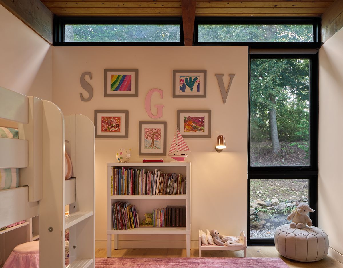 The girls' room, which has a glass door that leads to the backyard.