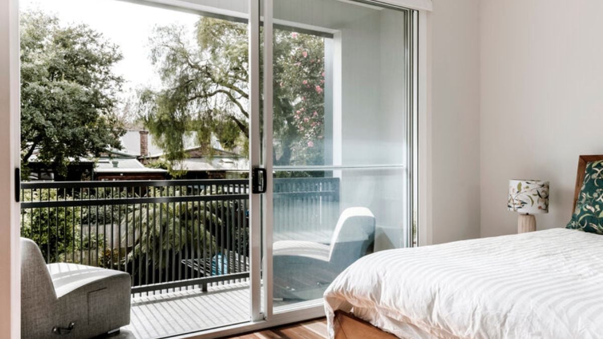 A new master bedroom to the rear is provided with a balcony to take advantage of a borrowed landscape.