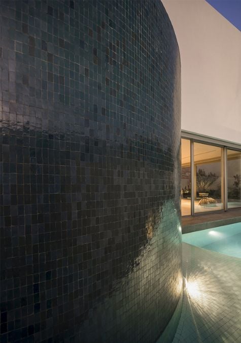 The photograph's focus on the tiles provides viewers with a close-up look at their patterns and designs, emphasizing their beauty and the expert craftsmanship required to create them.