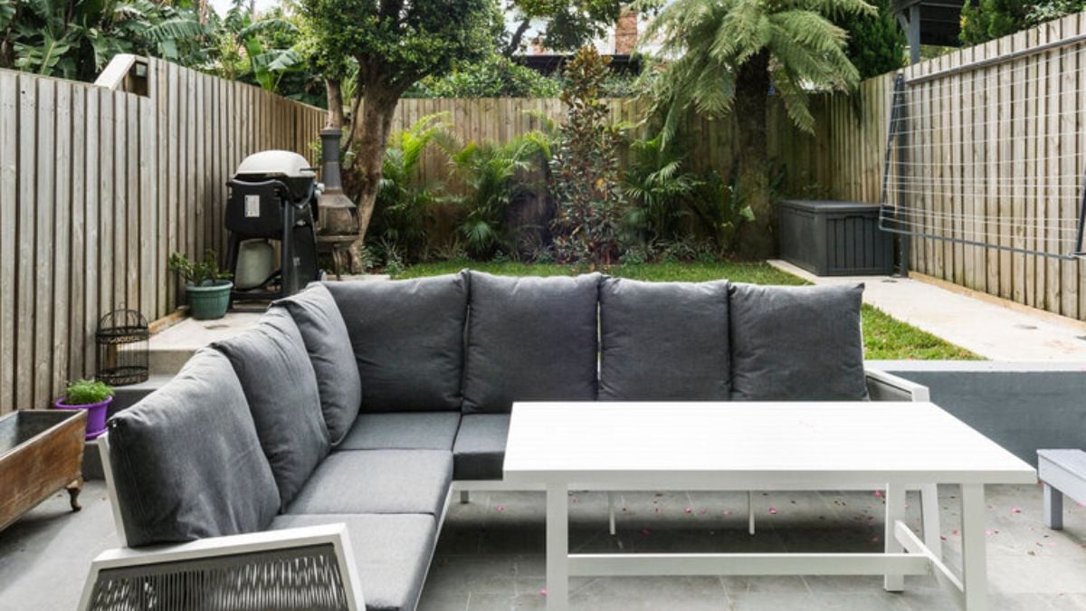 The patio in the rear of the house is the ideal area to relax.