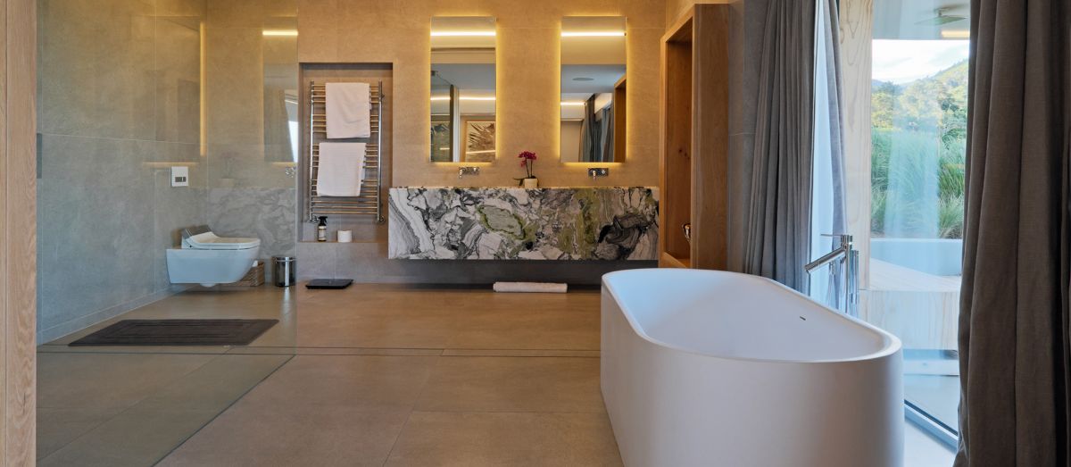 A master bedroom bathroom with a spacious minimalist design.