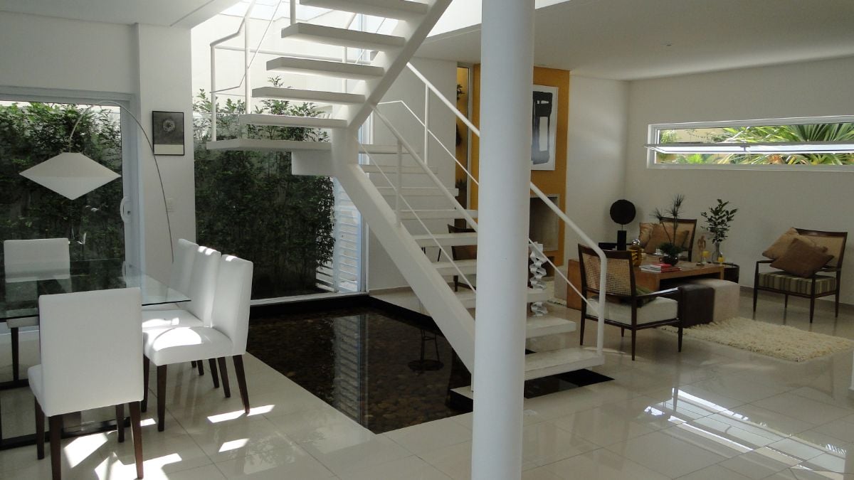The floating staircases lead to the upper floors.
