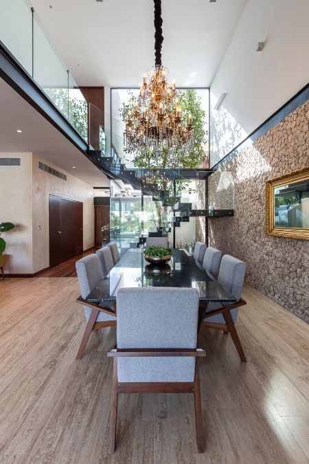 This photograph showcases the interior design of the dining area from another perspectives, offering a comprehensive view of the aesthetic elements within the space.
